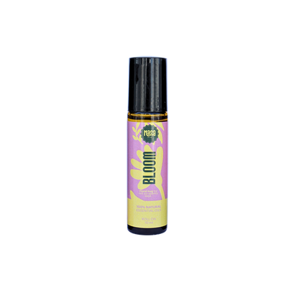 Manna BLOOM aroma roller, a 10 ml amber glass bottle with a pink and yellow label